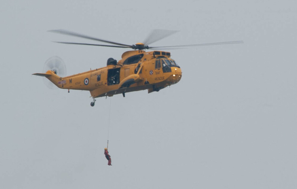 Wessex Sea King Helicopter, winching up a man